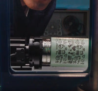 L'Art de l'Engraving Laser sur des Surfaces Courbes avec des Accessoires Rotatifs